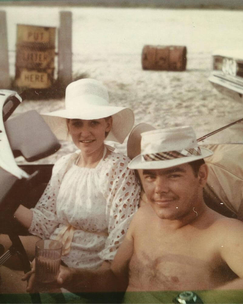 Man and woman in smiling on the beach